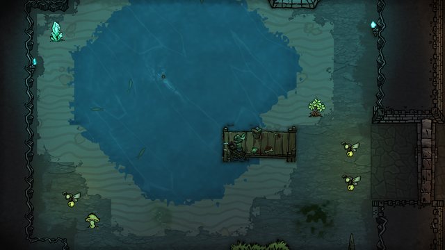 A minion fishes from a dock in the glowing underground grotto.