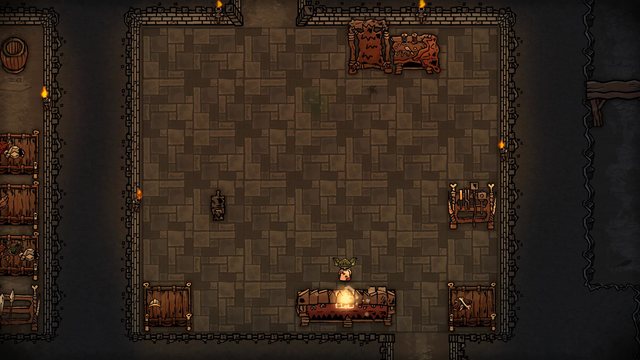 A goblin minion works at a crafting bench in the finished smithy.