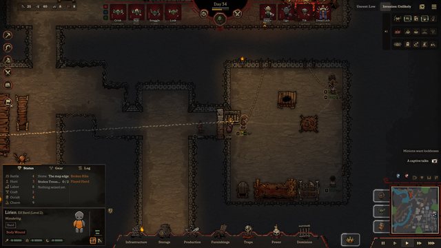A captured elf bard held in the Cell Block: their Status tab shows their stats, their wounds and the treasure they came to steal.
